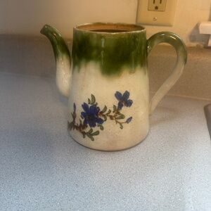 Handcrafted Ceramic Teapot with Green and Blue Floral Design